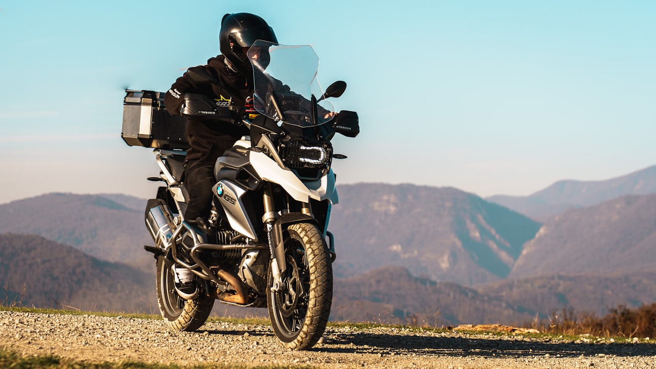 Royal Enfield Himalayan 450 climbing a rocky mountain trail