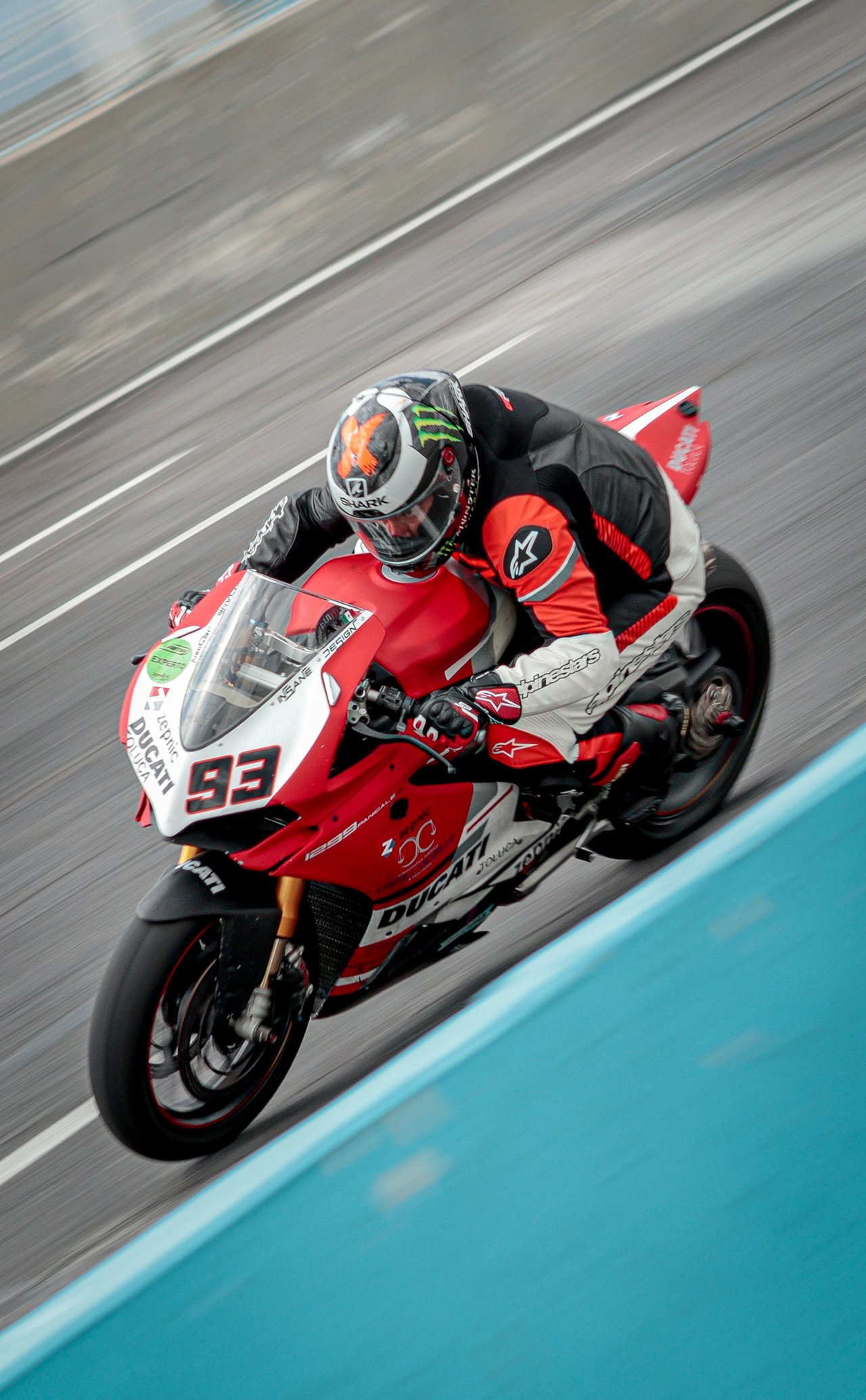 Ducati Panigale V4 leaned hard into a corner on a race circuit