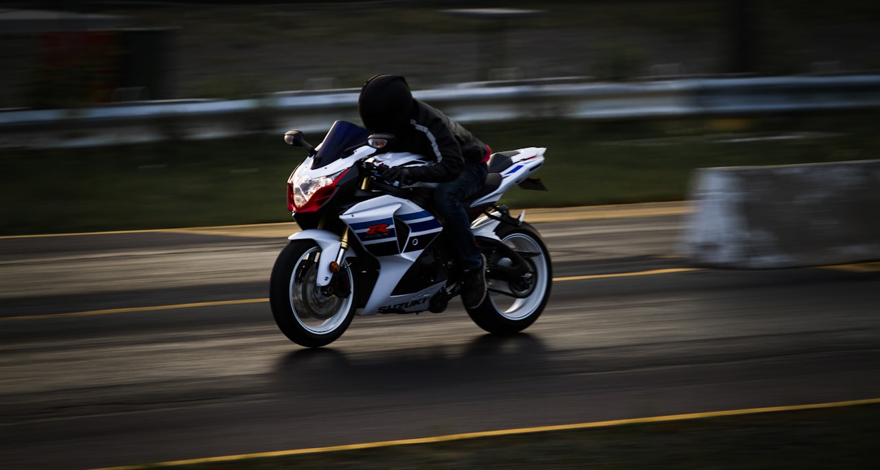 Production-based superbikes racing wheel to wheel through a fast corner